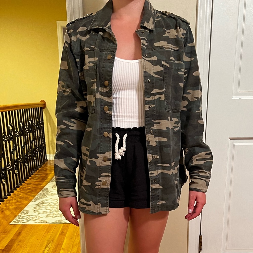 Camouflage jean jacket size S.